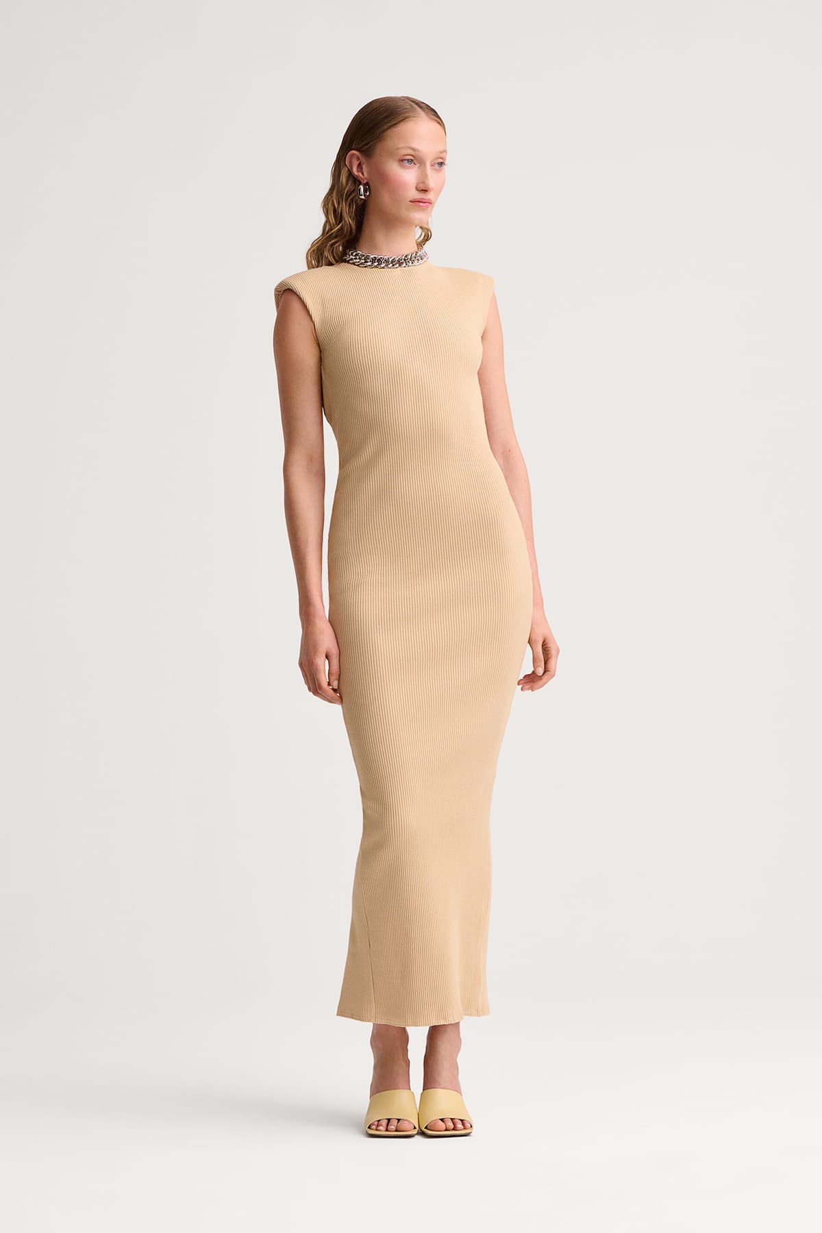 https://a.storyblok.com/f/199965/1200x1800/1482b8aebf/allora-dress-sand.jpg