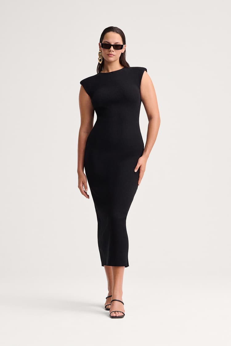 https://a.storyblok.com/f/199965/1200x1800/de55b1044f/allora-dress-black.jpg